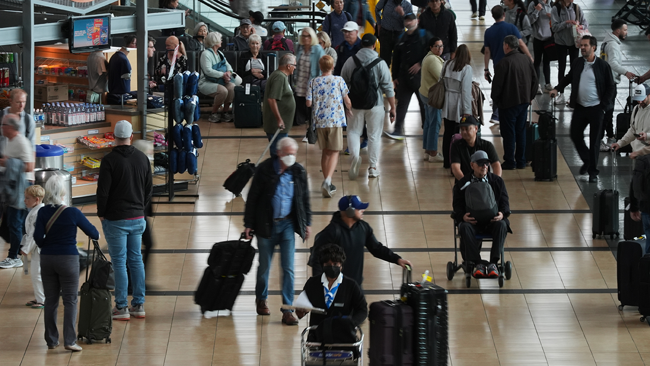 
                            FAA reductions in air traffic enter third day as US flights delayed and canceled